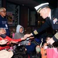 Passing out candy along the parade route.